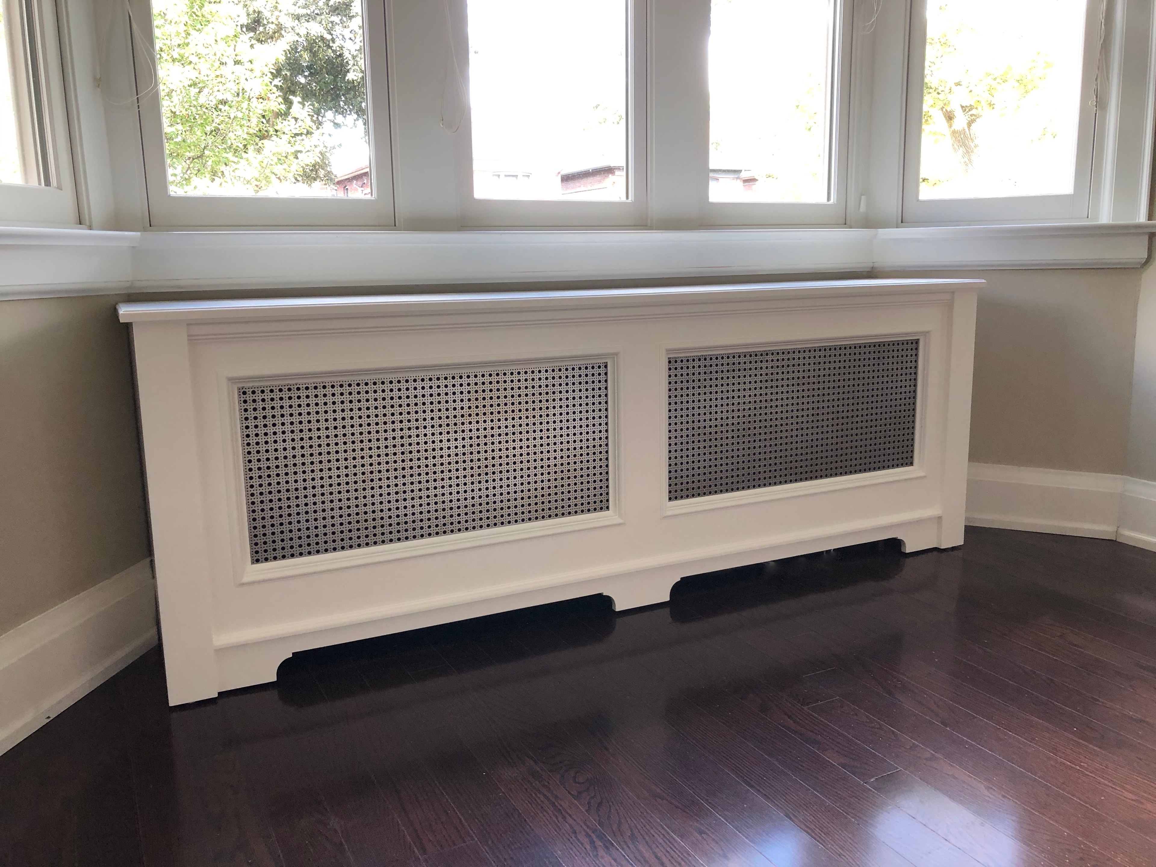 White radiator cover with window seat